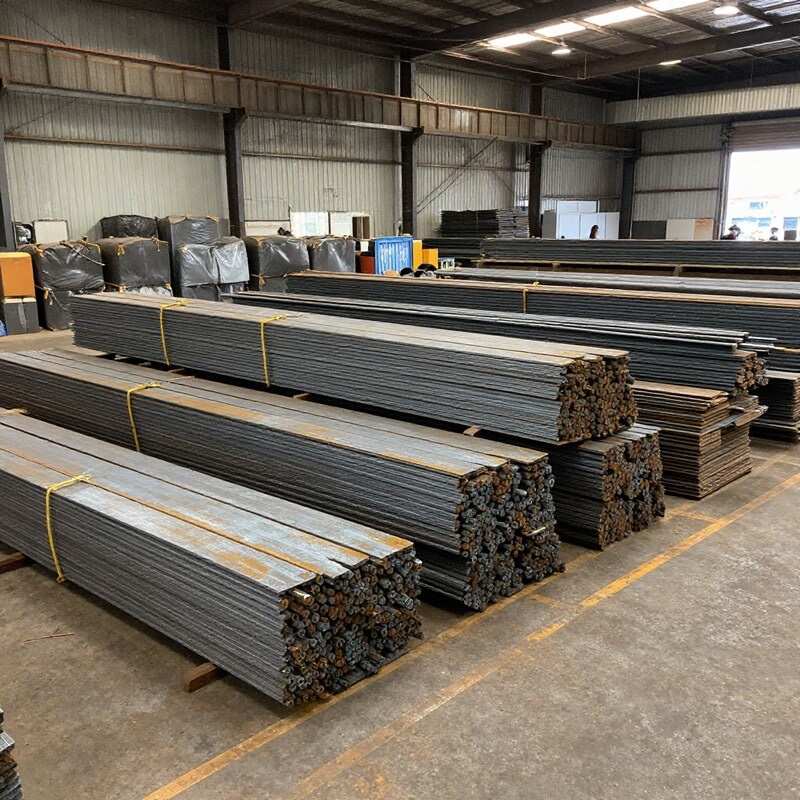 Sorted scrap steel beams, pipe, and sheet metal baled and ready for recycling at Prime Metal Recycling's Braeside Melbourne facility